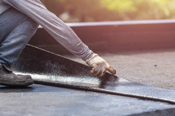 Professional Basement Waterproofing technician working in Tyrone, PA